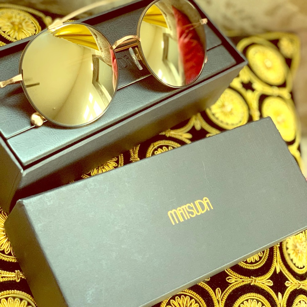 Matsuda sunglasses reflection tinted.